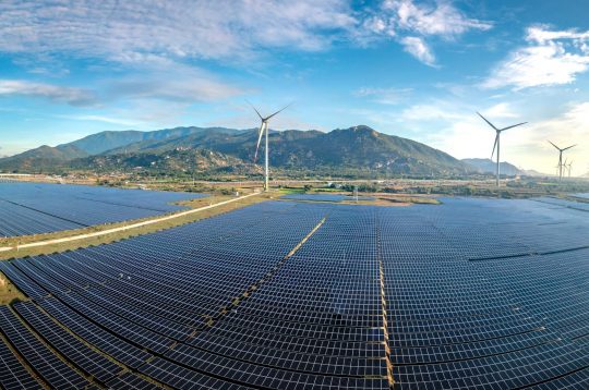 aerial-view-of-solar-farm-and-wind-turbines-35105458-pexels
